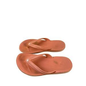Crocs size 9 flip flop sandals  peach pink (smudges )